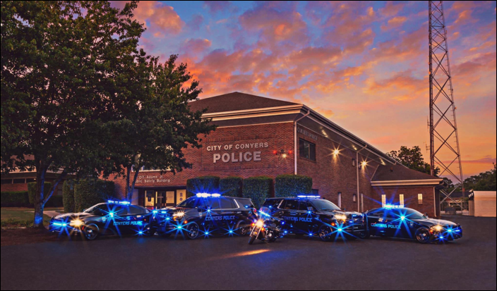 Exterior of CPD with cars & blue lights 2022